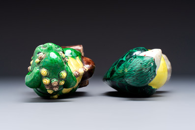 Three Chinese sancai-glazed Buddhist lions and a parrot, 19th C.