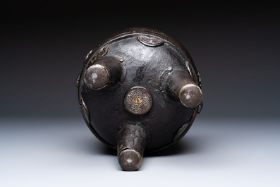 A Korean silver-inlaid iron 'He Lu Tong Chun 鶴鹿同春' tripod censer, Joseon, 18th C.
