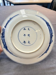 A Chinese blue and white dish and two Imari-style plates with figural design, Chenghua mark, Kangxi/Yongzheng