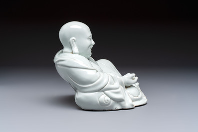 A fine Chinese white-glazed Milefo Buddha, 19th C.