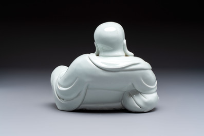 A fine Chinese white-glazed Milefo Buddha, 19th C.