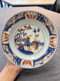 A Chinese blue and white dish and two Imari-style plates with figural design, Chenghua mark, Kangxi/Yongzheng
