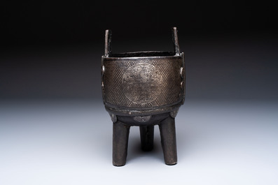 A Korean silver-inlaid iron 'He Lu Tong Chun 鶴鹿同春' tripod censer, Joseon, 18th C.