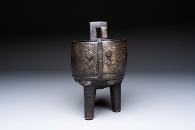 A Korean silver-inlaid iron 'He Lu Tong Chun 鶴鹿同春' tripod censer, Joseon, 18th C.