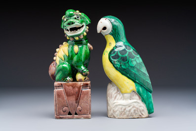Three Chinese sancai-glazed Buddhist lions and a parrot, 19th C.
