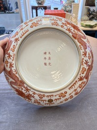 A Chinese gilt iron-red 'dragons and clouds' dish, Guangxu mark, 20th C.