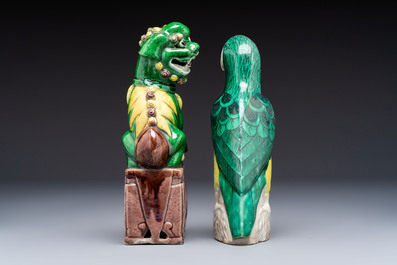 Three Chinese sancai-glazed Buddhist lions and a parrot, 19th C.