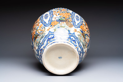 A large polychrome Gien faience 'Birds among Flowering Branches' vase, marked, France, 19/20th C.