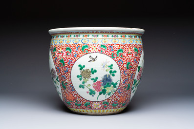 A large Chinese famille rose 'Bird among Flowering Branches' scroll pot, 19th C.