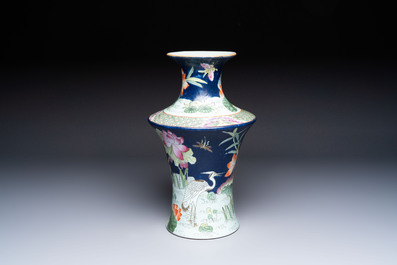 A Chinese famille rose blue-ground 'Lotus Pond' vase, Daoguang mark, 20th C.