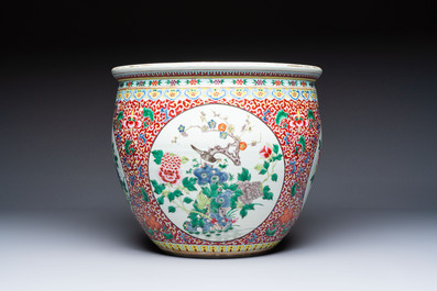 A large Chinese famille rose 'Bird among Flowering Branches' scroll pot, 19th C.