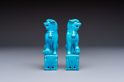 A pair of Chinese turquoise-glazed cats and a pair of Buddhist lions, 20th C.