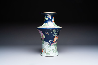 A Chinese famille rose blue-ground 'Lotus Pond' vase, Daoguang mark, 20th C.