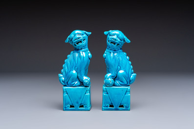 A pair of Chinese turquoise-glazed cats and a pair of Buddhist lions, 20th C.