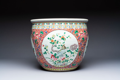 A large Chinese famille rose 'Bird among Flowering Branches' scroll pot, 19th C.