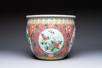 A large Chinese famille rose 'Bird among Flowering Branches' scroll pot, 19th C.