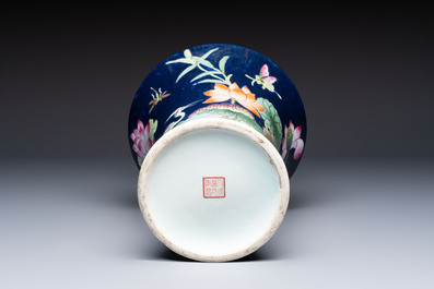 A Chinese famille rose blue-ground 'Lotus Pond' vase, Daoguang mark, 20th C.