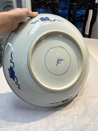 A large Chinese blue and white 'Lotus Scroll' dish, Kangxi