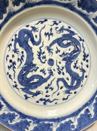 A pair of Chinese blue and white 'Dragon' dishes, Chenghua mark, Kangxi