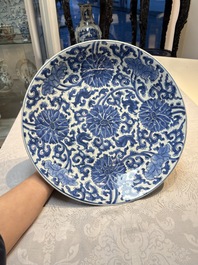 A large Chinese blue and white 'Lotus Scroll' dish, Kangxi