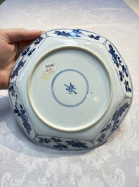 A pair of Chinese blue and white plates with floral design, Ding 鼎 mark, Kangxi