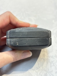 A Chinese carved black pottery 'Mythical Animal' box and cover, Yuan/Ming