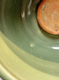 A large Chinese Longquan celadon tripod censer with floral design, Ming