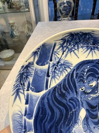 A large Japanese Arita blue and white 'Tiger' dish, Fuuki Chousun 富貴長春 mark, late Edo to early Meiji, 18/19th C.