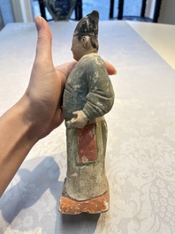 Three Chinese polychrome pottery figures, Sui/Ming