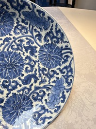 A large Chinese blue and white 'Lotus Scroll' dish, Kangxi