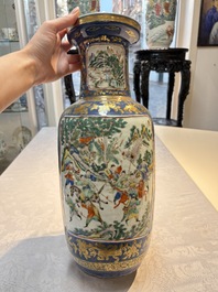 A pair of Chinese famille verte blue-ground gilt-decorated vases and a famille rose 'Elegant Beauties' vase, 19th C.