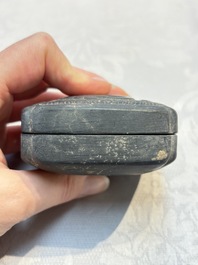 A Chinese carved black pottery 'Mythical Animal' box and cover, Yuan/Ming