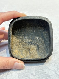 A Chinese carved black pottery 'Mythical Animal' box and cover, Yuan/Ming