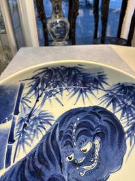 A large Japanese Arita blue and white 'Tiger' dish, Fuuki Chousun 富貴長春 mark, late Edo to early Meiji, 18/19th C.