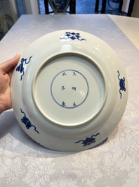 A pair of Chinese blue and white 'Dragon' dishes, Chenghua mark, Kangxi