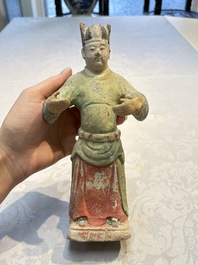 Three Chinese polychrome pottery figures, Sui/Ming