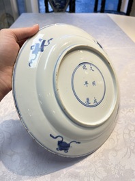 A pair of Chinese blue and white 'Dragon' dishes, Chenghua mark, Kangxi