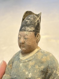 Three Chinese polychrome pottery figures, Sui/Ming