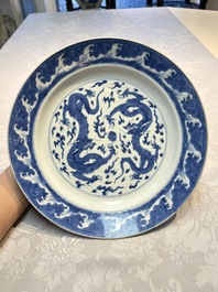 A pair of Chinese blue and white 'Dragon' dishes, Chenghua mark, Kangxi