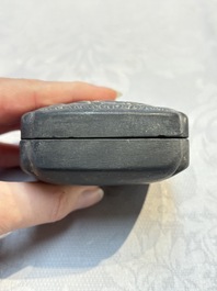 A Chinese carved black pottery 'Mythical Animal' box and cover, Yuan/Ming