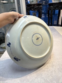 A large Chinese blue and white 'Peony Scroll' dish, artemisia leaf mark, Kangxi