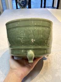 A large Chinese Longquan celadon tripod censer with floral design, Ming
