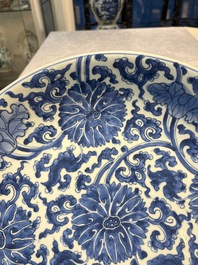 A large Chinese blue and white 'Lotus Scroll' dish, Kangxi
