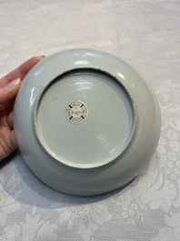 A set of 12 Chinese blue and white 'Landscape' bowls and saucers, Qianlong/Jiaqing