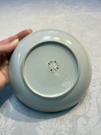 A set of 12 Chinese blue and white 'Landscape' bowls and saucers, Qianlong/Jiaqing