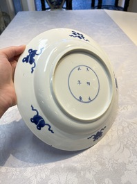A pair of Chinese blue and white 'Dragon' dishes, Chenghua mark, Kangxi