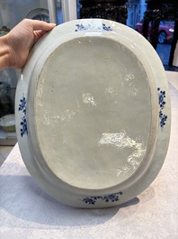 Two Chinese blue and white chargers with floral and landscape design, Qianlong