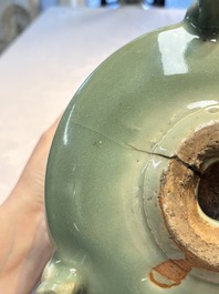 A large Chinese Longquan celadon tripod censer with floral design, Ming