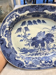 Two Chinese blue and white chargers with floral and landscape design, Qianlong