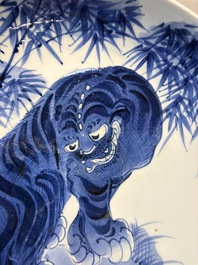 A large Japanese Arita blue and white 'Tiger' dish, Fuuki Chousun 富貴長春 mark, late Edo to early Meiji, 18/19th C.